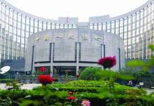 央行调整人民币兑美元汇率(图)